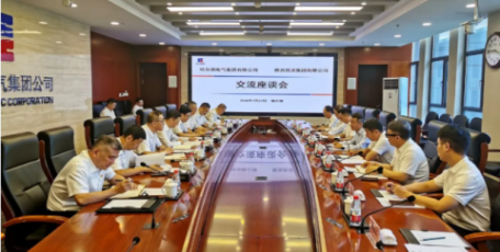 李元拜会哈尔滨电气集团党委书记、董事长黄伟